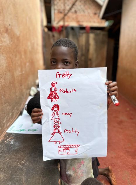 Child with artwork UpshiftYouthempowermentInitiative-USYEI